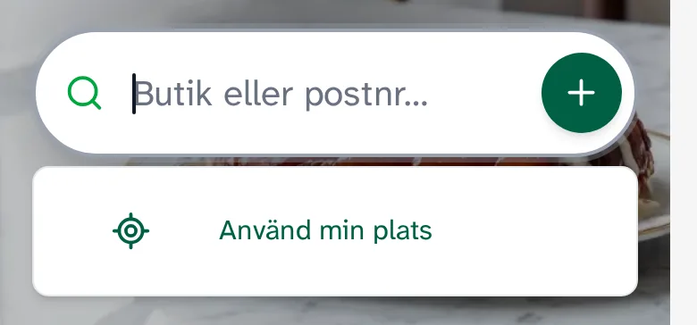 Den tomma sökrutan med en enda rad under: Använd min plats.
